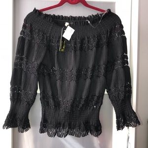 Black lace top over shoulder